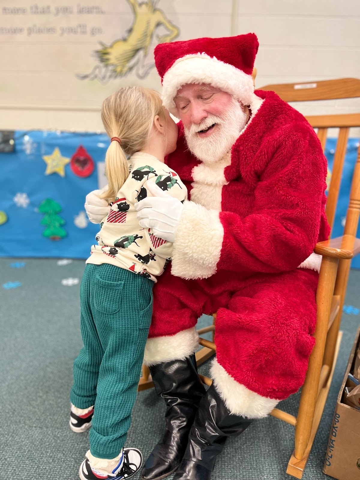Santa listening to a student